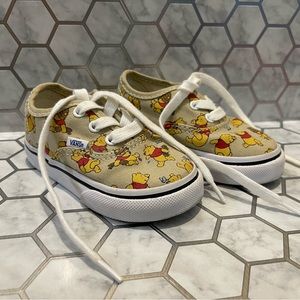 Pooh Bear Disney Vans toddler shoes.